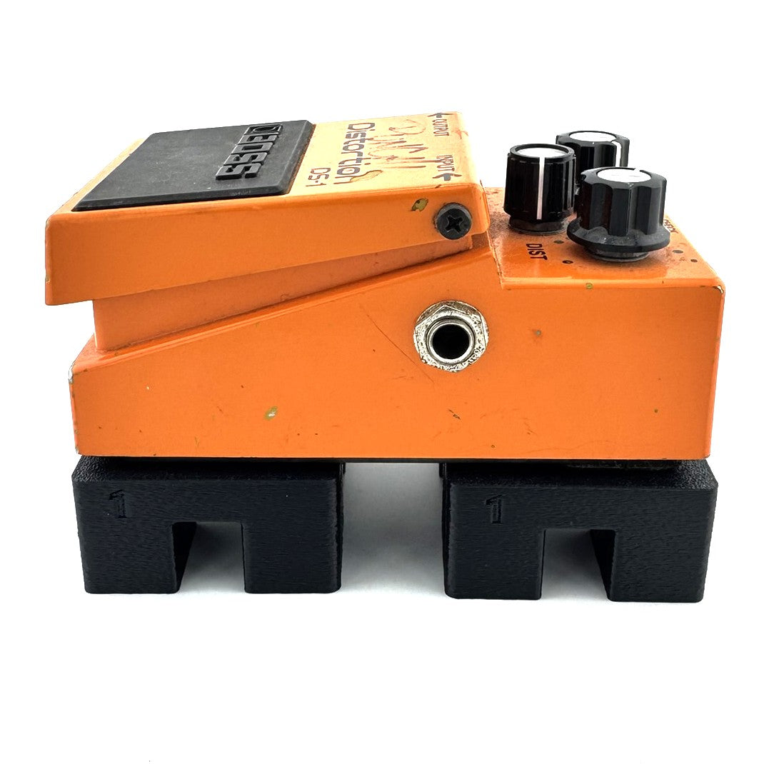 1" Pro Flat Pedal Risers from Nicholls Custom Designs being used to lift a Boss DS-1