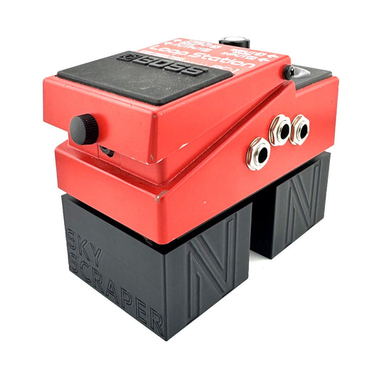 The SKY SCRAPER Pedal Riser from Nicholls Custom Designs being used to give lift to a Boss RC-1