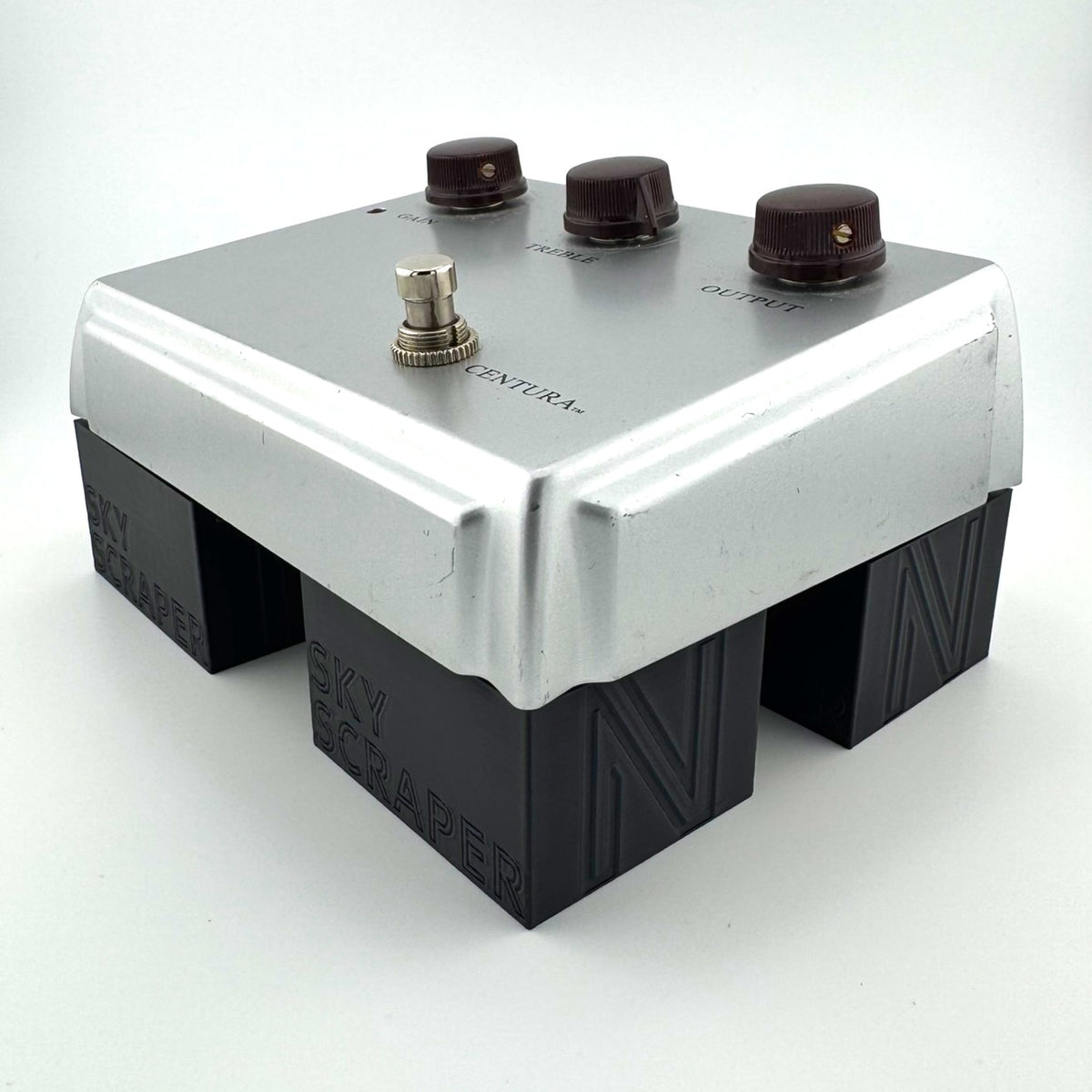 The SKY SCRAPER Pedal Riser from Nicholls Custom Designs being used to give lift to a Ceriatone Centura