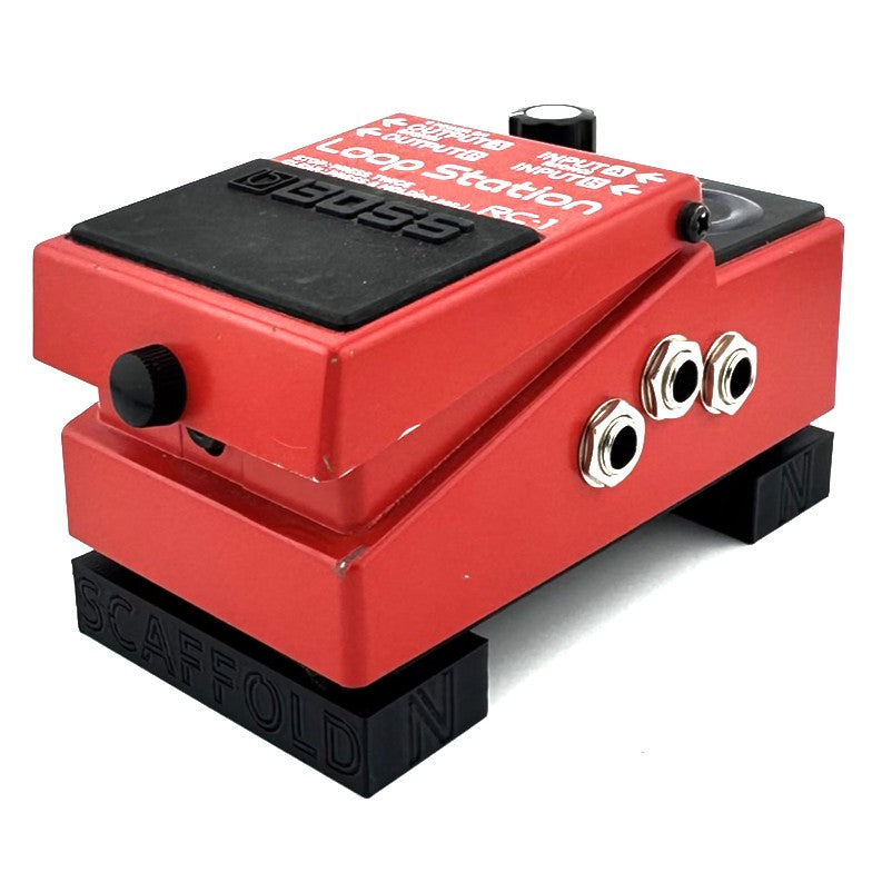 The SCAFFOLD Pedal Riser from Nicholls Custom Designs being used to give lift to a BOSS RC-1