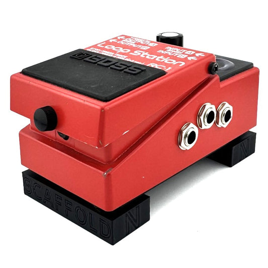The SCAFFOLD Pedal Riser from Nicholls Custom Designs being used to give lift to a BOSS RC-1